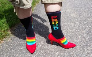 A member of Muskoka Pride shows of their socks and shoes at a past Walk A Mile event